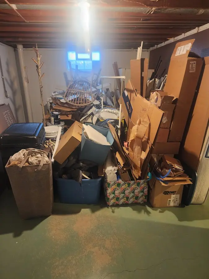 Roll-off dumpster container at job site for Cleanout Dumpster Rental in Windsor